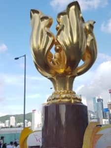 Golden Bauhinia Statue - Wan Chai Hong. Female solo traveller in Asia