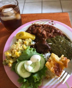 How to save US$1,700.00 in 10 months to travel -Cook your own food to save to travel A typical Sunday lunch in Trinidad & Tobago