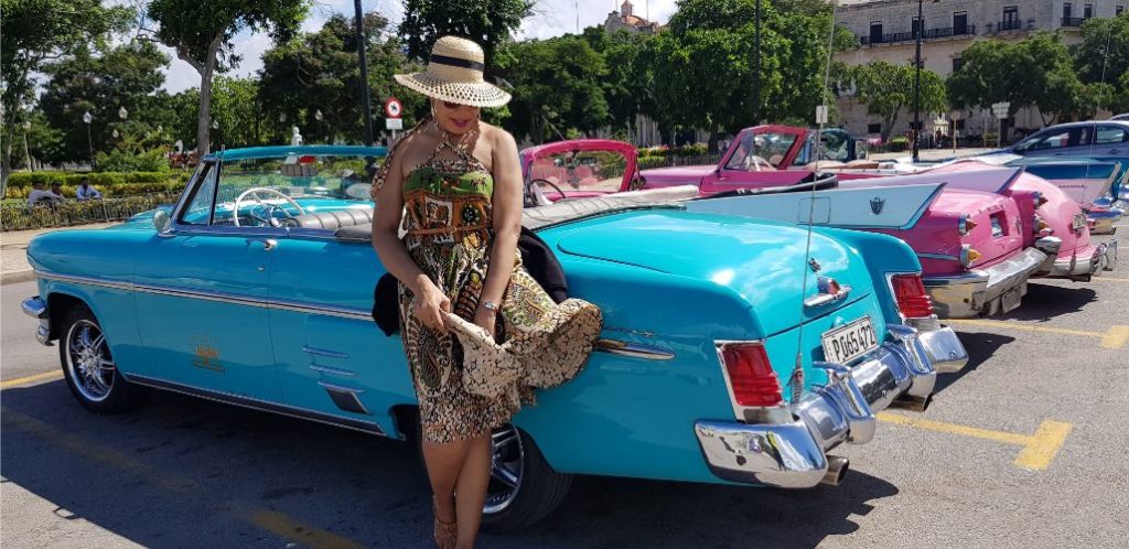CoraDexplorer and Classic 19th century cars in Havana Cuba