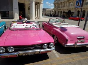 guide to a solo vacation in Cuba. Classic 19th century cars in Havana Cuba