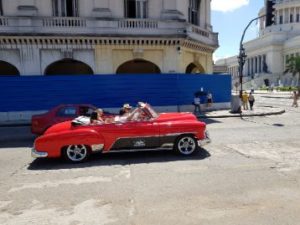 Classic 19th century cars in Havana Cuba. guide to a solo vacation in Cuba
