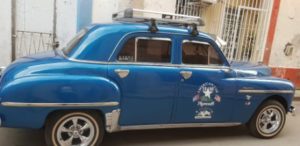 guide to a solo vacation in Havana Cuba,Classic 19th century cars in Havana Cuba