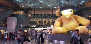 6.8 million dollars , 35,000 pound (bronze) Lamp Bear @ Doha Airport, Flying economy with Qatar Airways