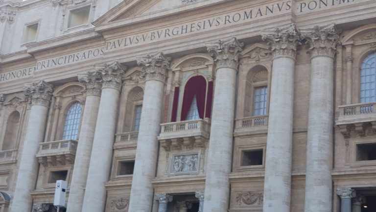 The balcony from which the pope addresses the gathering at St Peter's Basilica Square. Vatican City the smallest country in the world