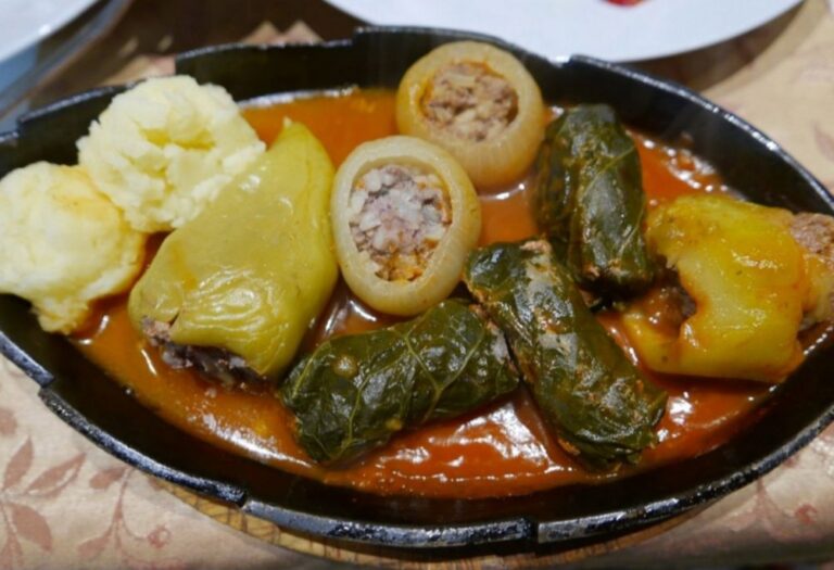 A typical Bosnian platter (Dolma, Sarma and Potatoes). solo traveller in Sarajevo, Bosnia and Herzegovina.