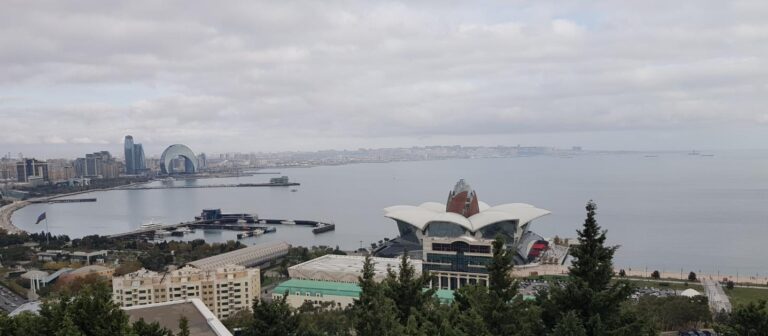 A view of the Half Moon/Full Moon Hotel The Deniz Mall (lotus building) from Highland Park. Azerbaijan the land of fire