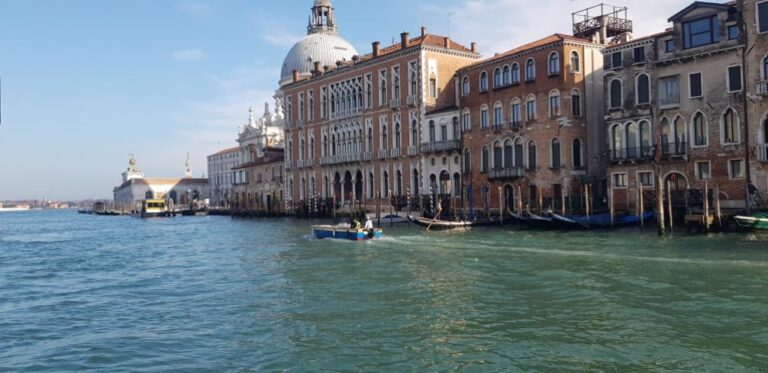 Buildings including the Basilica di Santa Maria Gloriasa dei Frari along the Grand Canal. Venice, Italy’s floating city