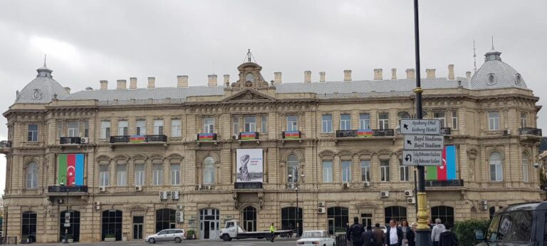 Buildings with flags adorned in the Baku city. Azerbaijan the land of fire