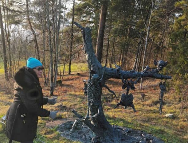 Ekerbergparken -sculpture of burnt skeletal remains on a tree. Norway is home to the Midnight Sun and Polar Nights