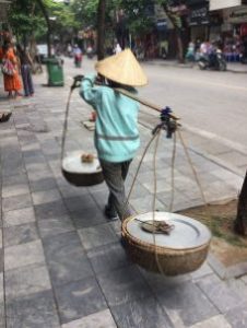 A true traditional way of selling hot potatoes in Vietnam