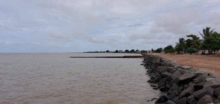 The brownish sea waters at the Georgetown Kingston Seawall. Guyana, the Land of Many Waters