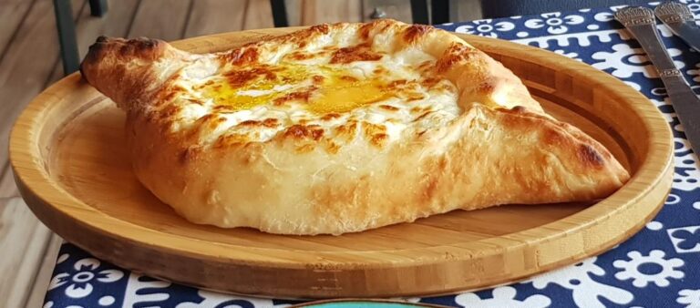 Khachapuri (shaped like a boat with egg, butter or melted cheese). Georgia, the mystical transcontinental nation