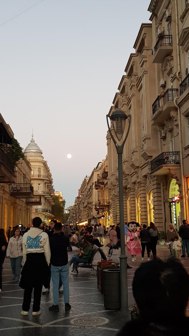 Nizami Street - the popular tourist street (check out the size of the moon). Azerbaijan the land of fire