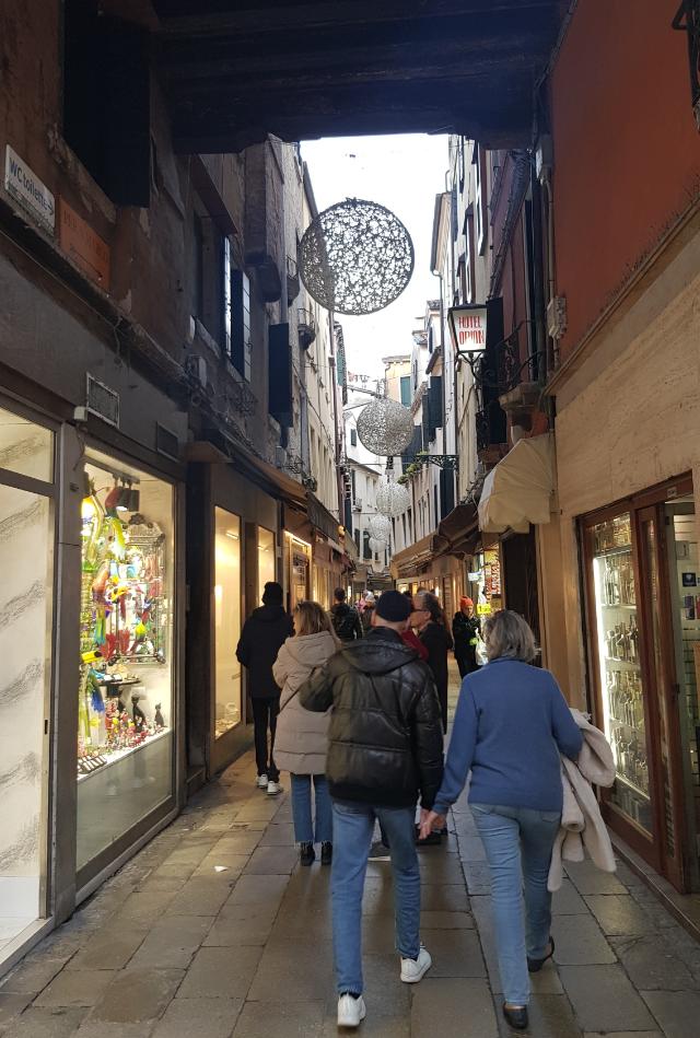 One of the narrow shopping street downtown Venice. Venice, Italy’s floating city