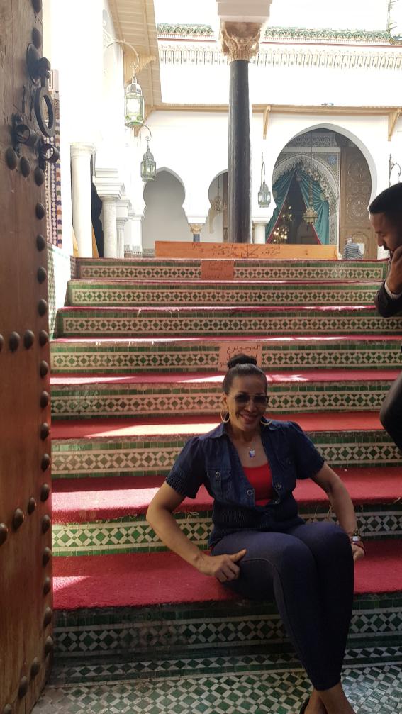 Sitting oin the stairs of the Al Quaraouiyine University (Kairaouine Mosque) - Fez. Morocco, the Western Kingdom of Africa