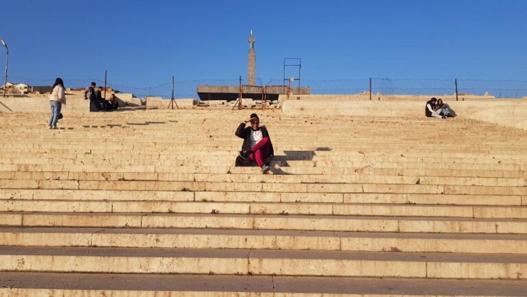 Sitting on the steps of the Cascade Complex. Armenia, the first country to accept Christianity