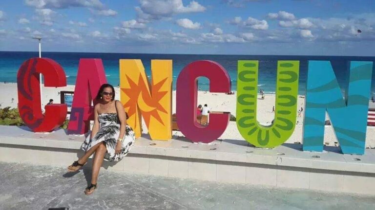 The Cancun sign in front the Playa Delfines Beach. 21 friendliest people and countries to visit