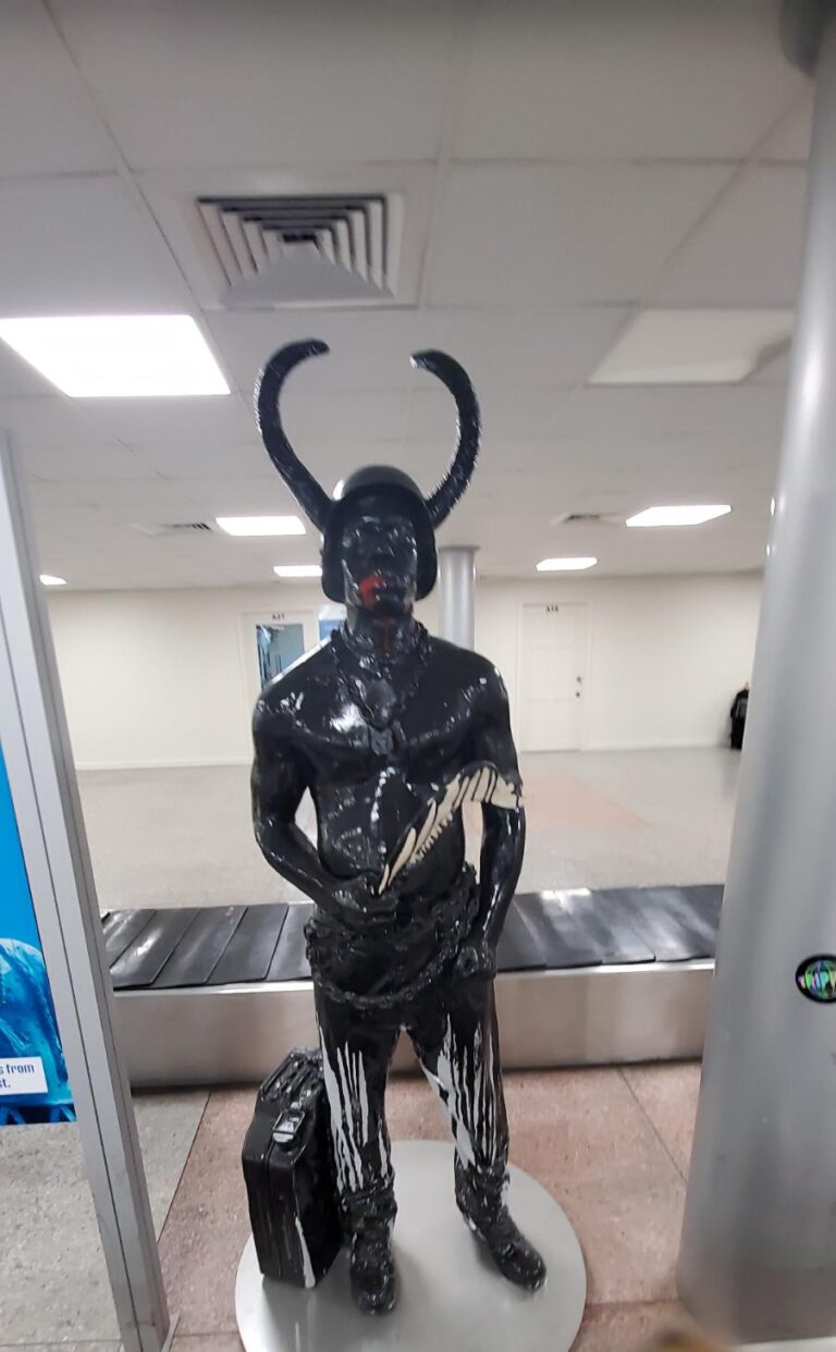 The Jab Jab sculpture (Jab Molassie) at the airport. Grenada, the Spice Isle of the Caribbean