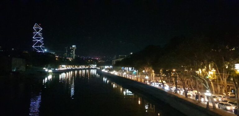 he Kura River at might in the Tbilisi city center. Georgia, the mystical transcontinental nation