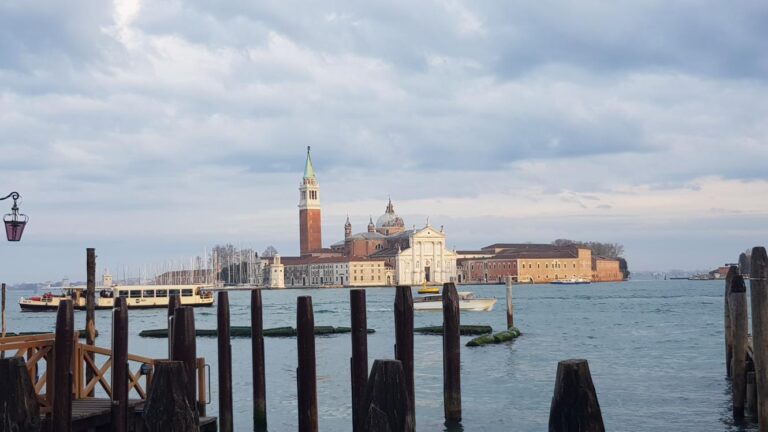 The St. George Maggiore Island with the church of Palladio and the Campanile bell tower di San Giorgio Maggiore Bell Tower. Venice, Italy’s floating city