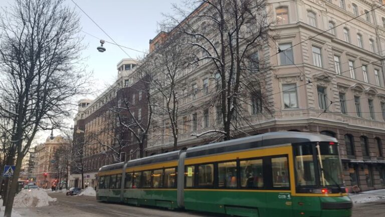the city Tram- downtown Helsinki. Finland is the happiest country on earth