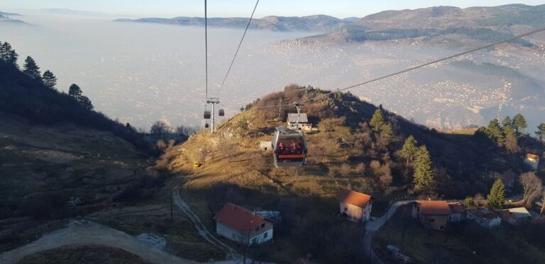 View of the Sarajevo city, covered in fog, from the cable car. solo traveller in Sarajevo, Bosnia and Herzegovina.
