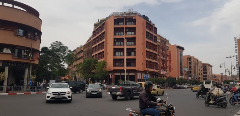 pink buildings and motorbikes in the city of Marrakech. Morocco, the Western Kingdom of Africa