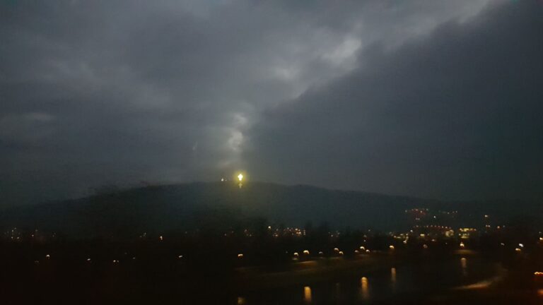 the Millennium Cross on entering the city at nights. North Macedonia - the birthplace of Mother Teresa